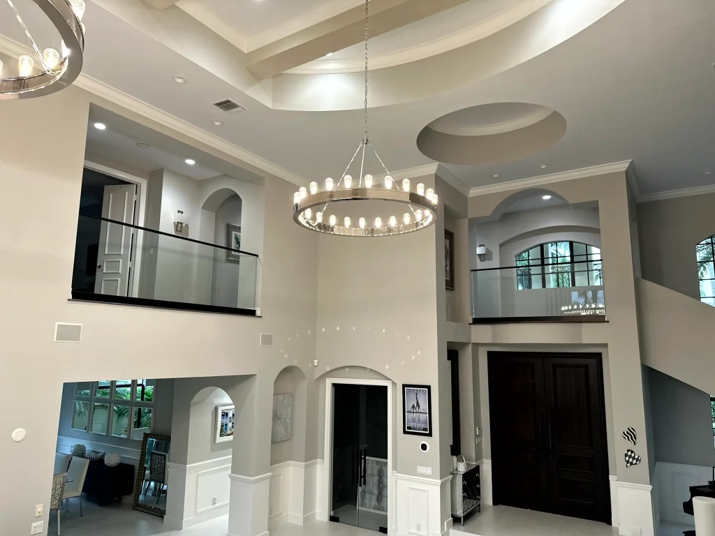 Luxurious crystal glass and mirror chandelier enhances modern interior design.