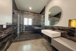 High-quality mirror and glass shower for modern bathroom design.