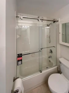 High-quality glass shower enclosure with sliding doors, ideal for modern bathrooms.