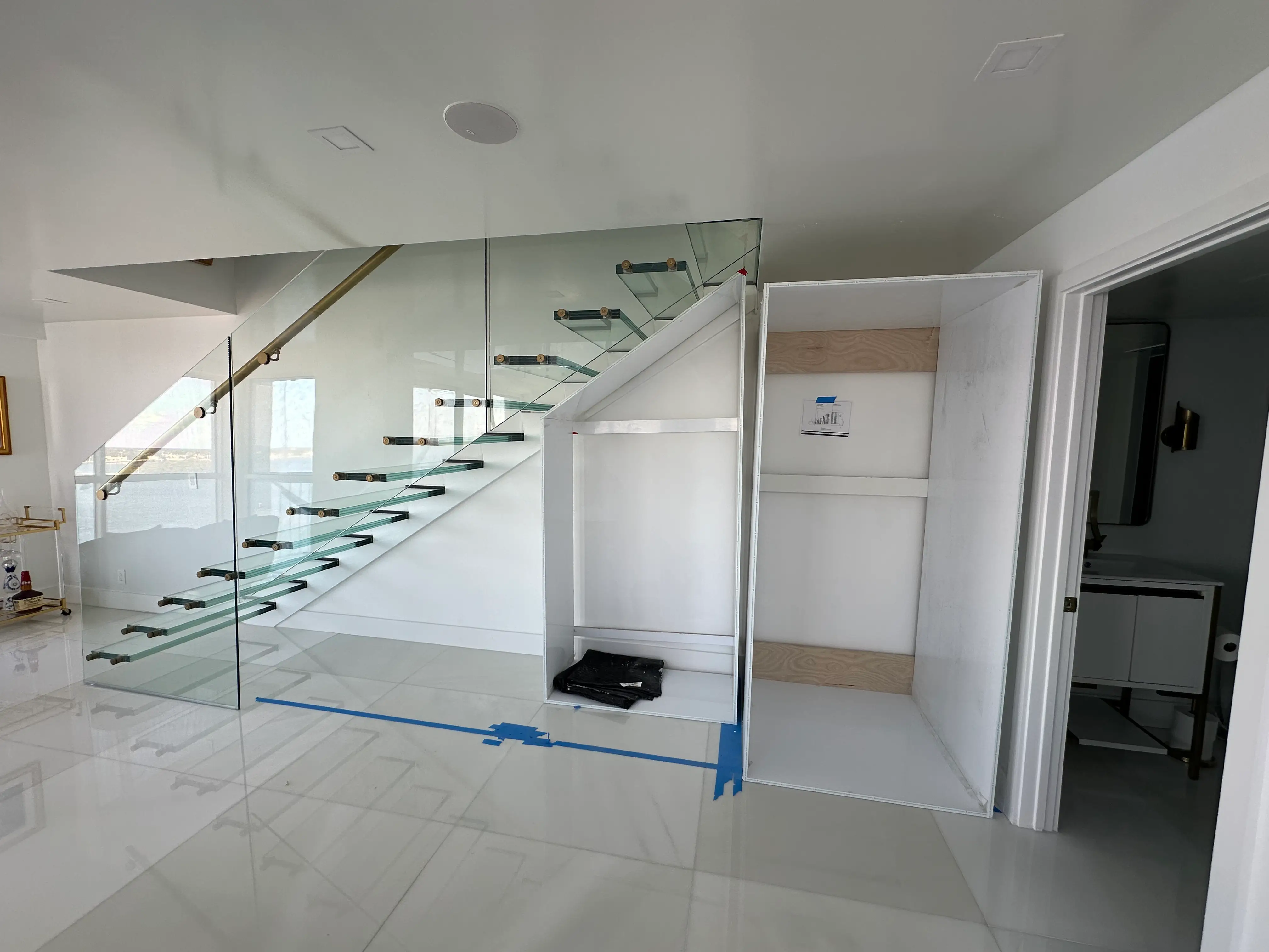Glass Railing with Wine Cellar in S Flagler Dr Residence
