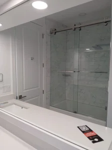 High-quality transparent glass shower enclosure in modern bathroom design.