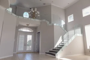 High-quality glass staircase with sleek glass railings in modern home decor.