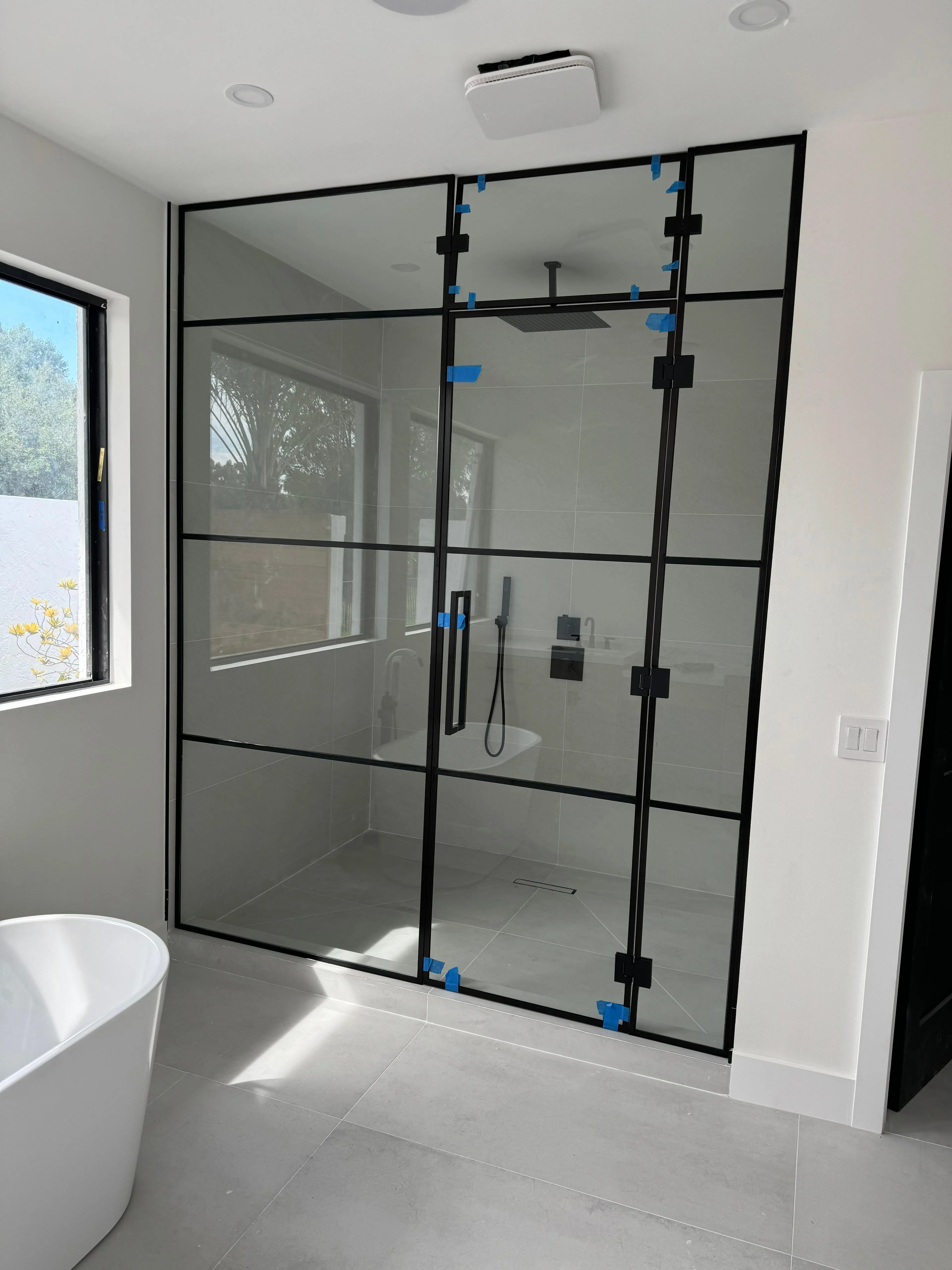 Shower Doors at Breakers West Blvd Residence