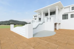 High-quality glass and metal balcony railing installed on a white residential property.
