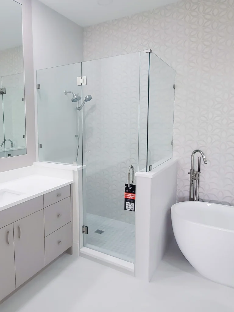 High-quality glass shower door for modern bathrooms with sleek hardware.