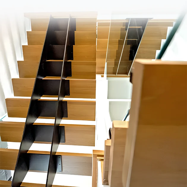 The Oslo floating stairs redefine structural integrity with twin steel cores—perfect harmony of form and function.