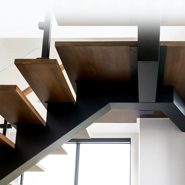 The Paris floating stairs redefine versatility with their central steel spine—a perfect balance of form and function.