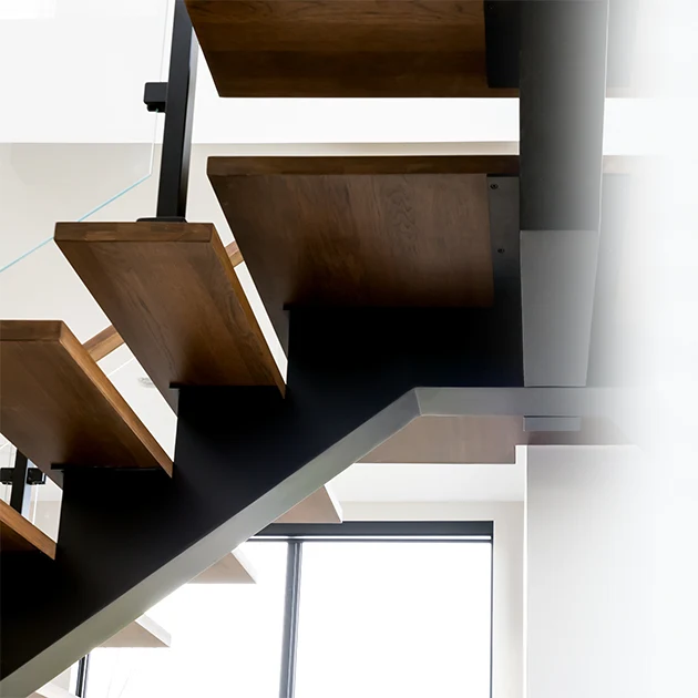 The Paris floating stairs redefine versatility with their central steel spine—a perfect balance of form and function.