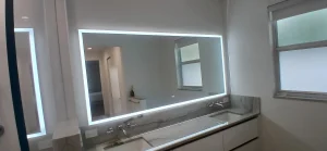 Clean and stylish bathroom mirror with integrated LED lighting for contemporary design.
