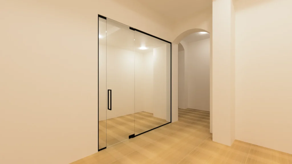 Bright modern interior with sleek glass and mirror sliding door. Elegant design enhances contemporary home style.