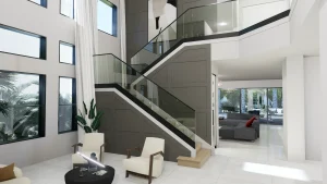Bright spacious living room with large windows, neutral decor, and indoor plants.