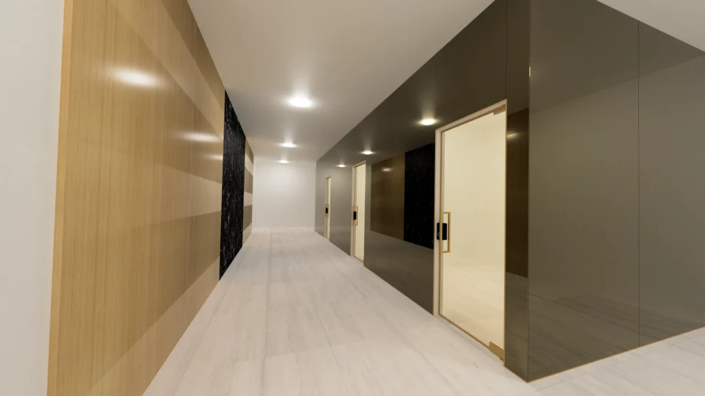 Stunning glass and mirror elevator area with sleek design and elegant materials.