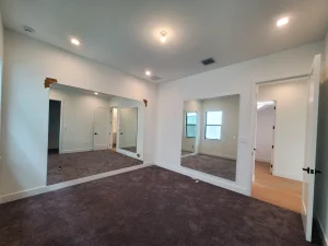 Large decorative mirror in living room.