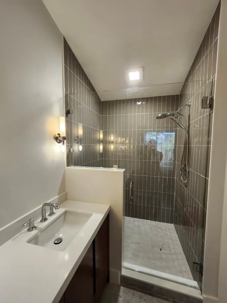 High-quality mirror and glass shower enclosure with sleek design.