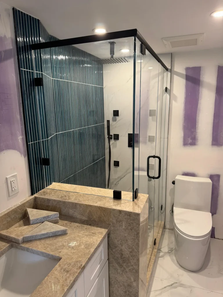 High-quality frameless glass shower door with black hardware for stylish bathroom upgrades.