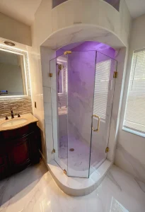 High-quality mirror and glass shower door installation.