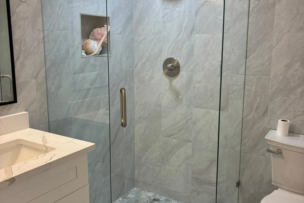 Frameless neo angle shower enclosure with brushed nickel hardware, West Palm Beach