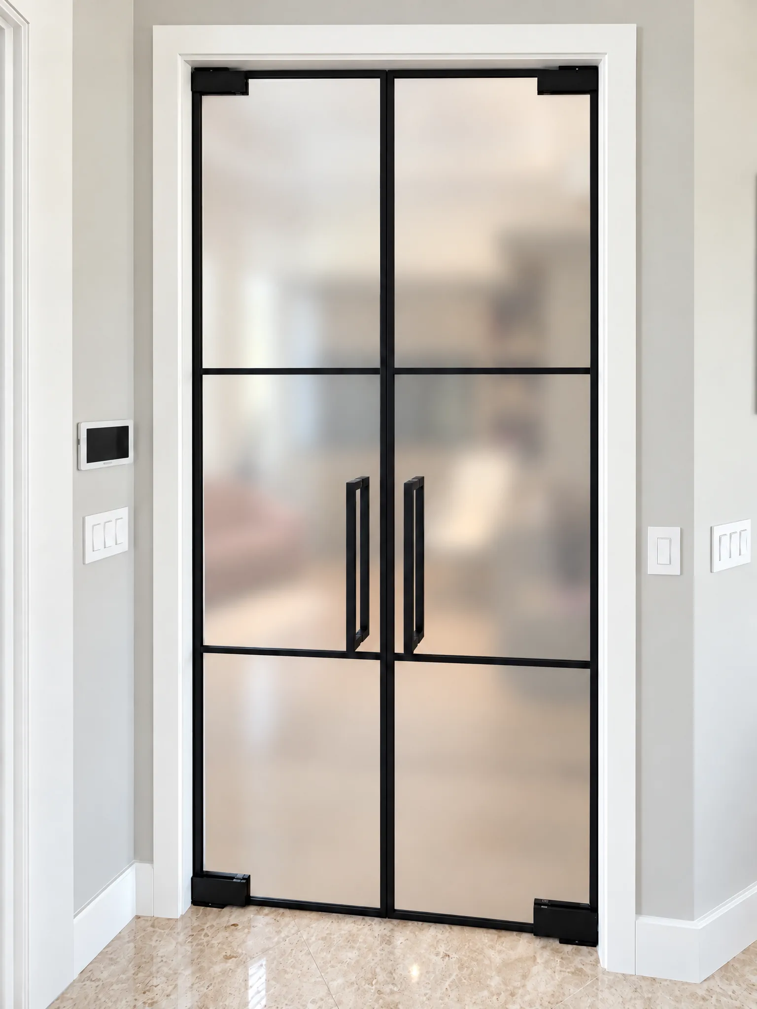Black grid glass partition with acid-etched glass