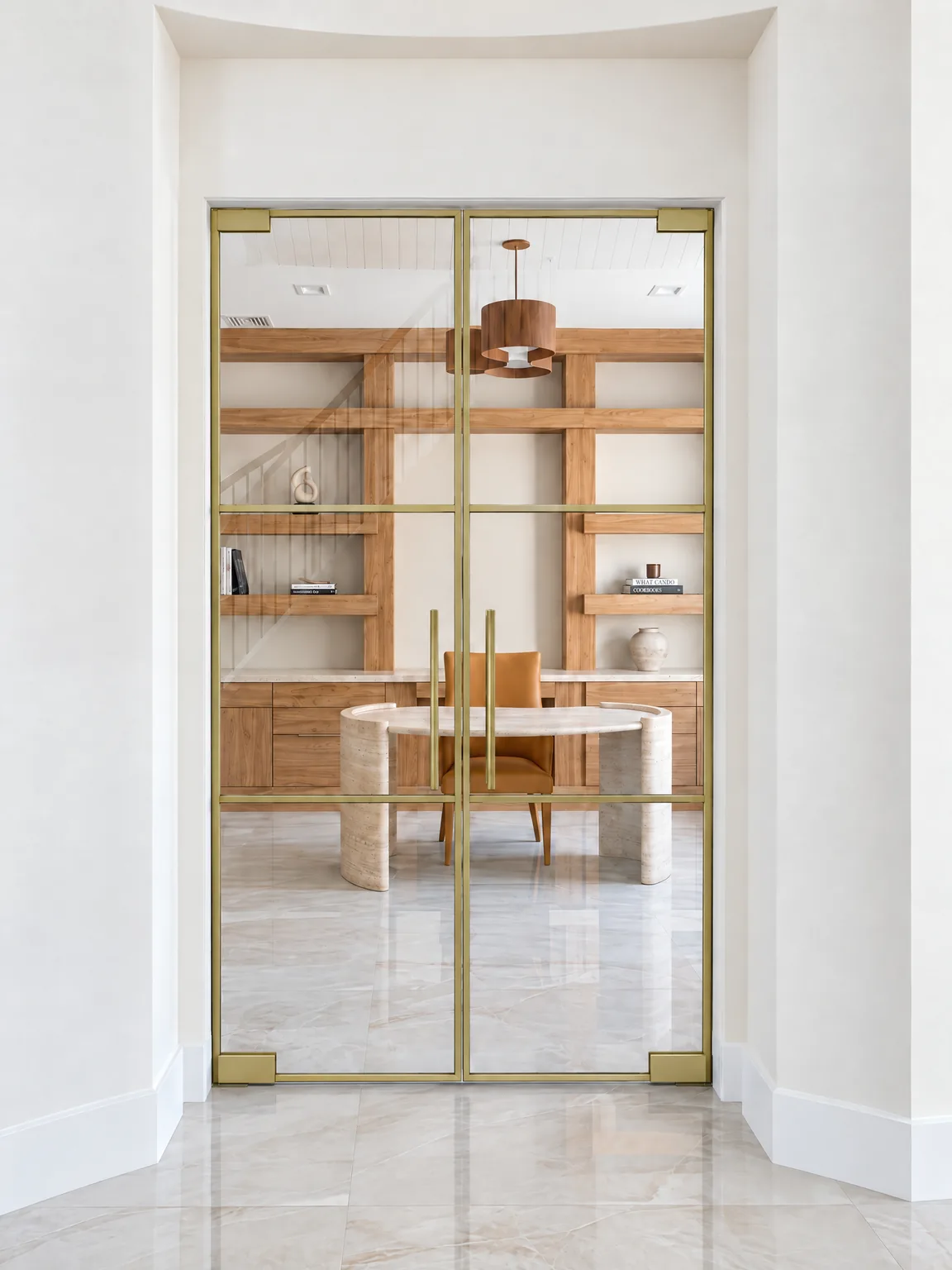 Horizontal glass partition double doors in brushed gold