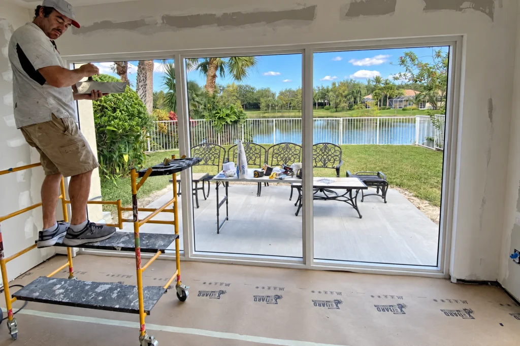 Impact French door and fixed windows enclosing a patio in Wellington