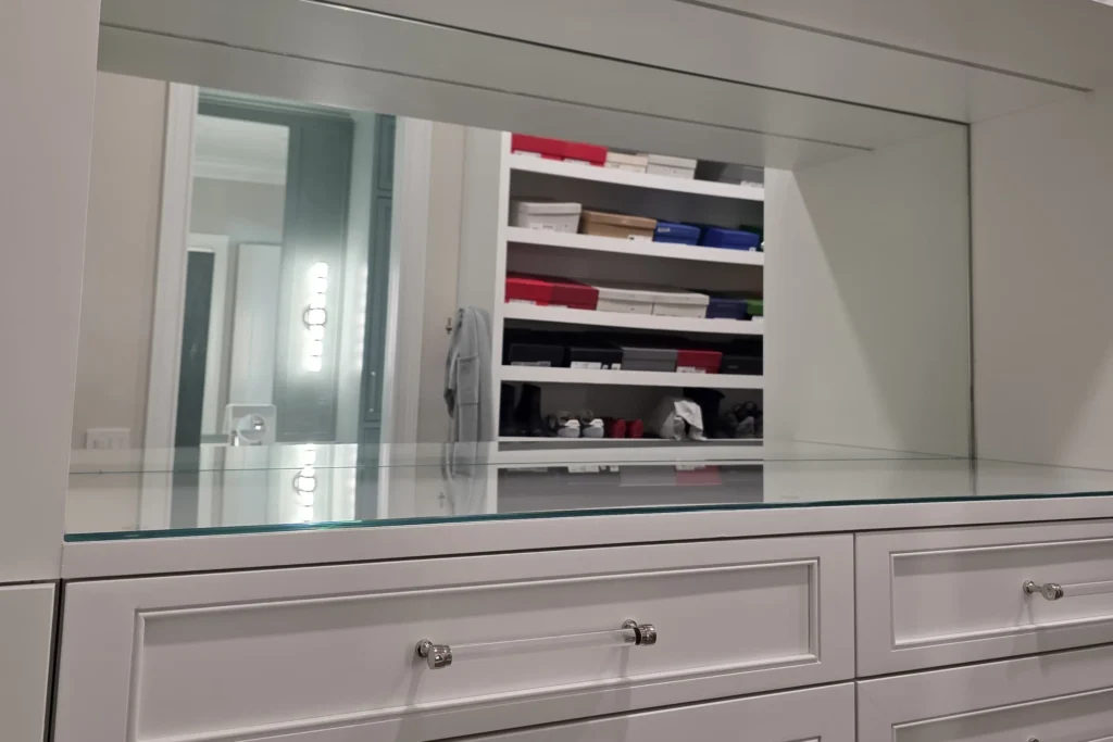 Closet mirror with low iron glass top on the dresser, Marsh Cove residence, Palm Beach Gardens