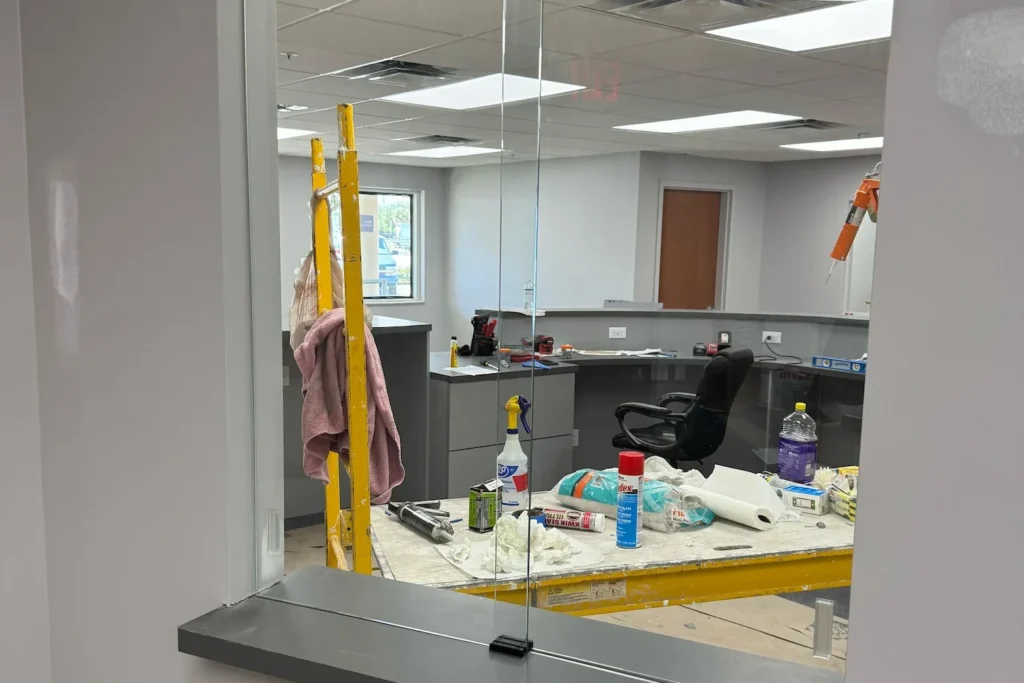 Clear glass pass-thru window installed in an office on North Military Trail, Riviera Beach