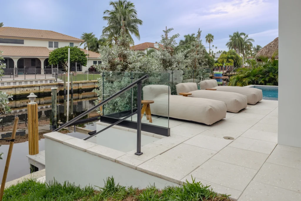 Frameless glass railing on a waterfront balcony and patio in Boca Raton